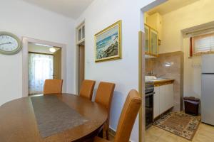Kuchyň nebo kuchyňský kout v ubytování Apartments Štefi 869