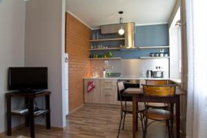 Una cocina o zona de cocina en Prenzel Apartments - City