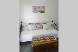 A bed or beds in a room at Paradise edge near the sea Még 9 kép