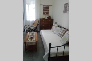 A bed or beds in a room at Paradise edge near the sea