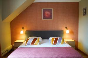 Postel nebo postele na pokoji v ubytování Hotel Prins van Oranje