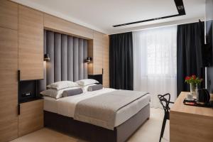 Postel nebo postele na pokoji v ubytování Luxury rooms Unicus I, II, IV