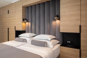 Postel nebo postele na pokoji v ubytování Luxury rooms Unicus I, II, IV