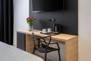 Příslušenství pro přípravu čaje a kávy v ubytování Luxury rooms Unicus I, II, IV