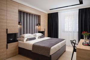 Postel nebo postele na pokoji v ubytování Luxury rooms Unicus I, II, IV