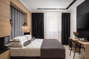 Postel nebo postele na pokoji v ubytování Luxury rooms Unicus I, II, IV