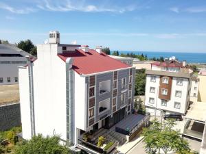an aerial view of a building with a red roof at İnce Apart Rezidence in Trabzon