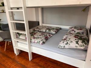 Krevet ili kreveti u jedinici u okviru objekta Apartmany u Synagogy