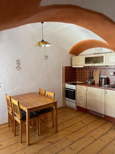 Kuchyň nebo kuchyňský kout v ubytování Apartmany u Synagogy