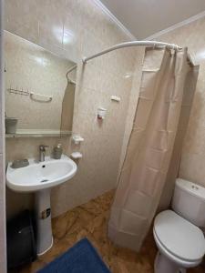 Koupelna v ubytování Hotel NATALI