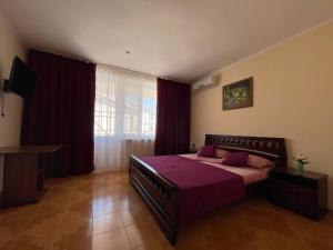 Postel nebo postele na pokoji v ubytování Hotel NATALI