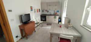 Kuchyň nebo kuchyňský kout v ubytování Via Pisa 20