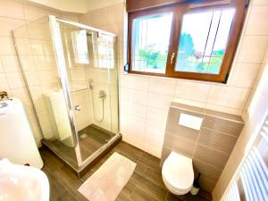 A bathroom at Unio Vendégház 1