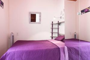 Ein Bett oder Betten in einem Zimmer der Unterkunft Palavas les Flots 2 bedrooms air-conditioned 100 meters from the beach