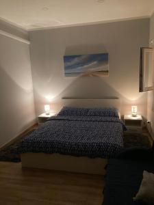 Łóżko lub łóżka w pokoju w obiekcie Apartman Turanj