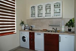 Kuchyň nebo kuchyňský kout v ubytování Apartment - Przy Rynku self check in 24h