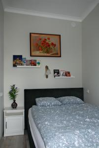 Кровать или кровати в номере Apartament - Przy Rynku