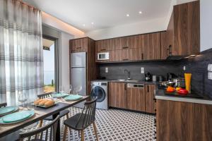 A kitchen or kitchenette at Horizon Ionian Villas
