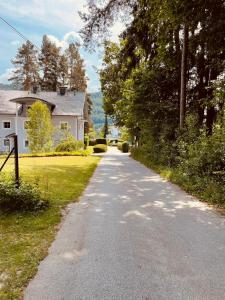 an empty road in front of a house at Bungalow Kathrin in Sankt Kanzian
