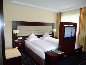 Postel nebo postele na pokoji v ubytování Akzent Hotel Löwen
