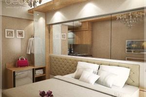 Dapur atau dapur kecil di Cosmy Orchard Apartment at Pakuwon Mall with Wifi