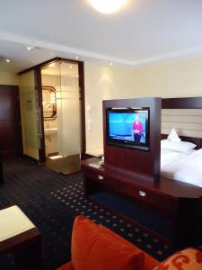 Postel nebo postele na pokoji v ubytování Akzent Hotel Löwen