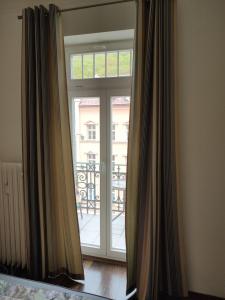 Postel nebo postele na pokoji v ubytování Apartmán 63m2 s balkonem v lázeňském centru