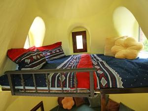 Voodi või voodid majutusasutuse Krka Fairytale village toas