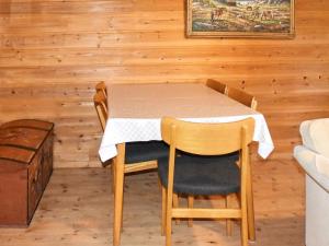 a dining room with a table and two chairs at Secluded Mountain Retreat-By Traum in Vassenden +27 photos