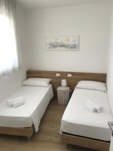 Postel nebo postele na pokoji v ubytování Podium