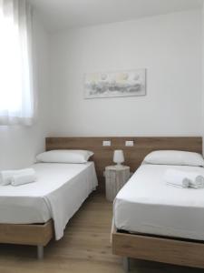 Postel nebo postele na pokoji v ubytování Podium