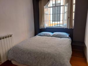 Cama o camas de una habitación en Casa Vacanze via dei Riari - Roma Trastevere