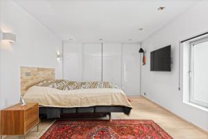 Giường trong phòng chung tại Stavanger Forum Apartment +14 ảnh