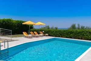 Πισίνα στο ή κοντά στο Yanni's Villas