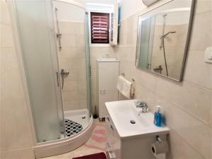 Koupelna v ubytování Apartment Vidovic + 11 fotografií