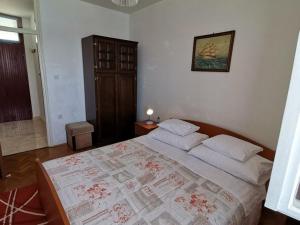 Postel nebo postele na pokoji v ubytování Apartment Vidovic