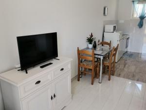 TV a/nebo společenská místnost v ubytování Apartment Vidovic