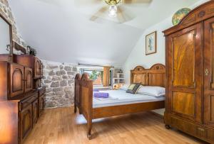 Tempat tidur dalam kamar di Mini stone house