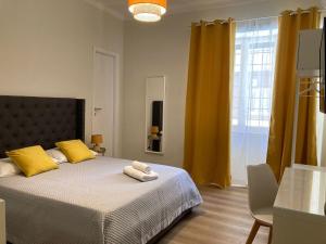 Cama o camas de una habitación en FAIROME Guest House