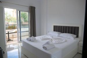 Postel nebo postele na pokoji v ubytování Hotel ZEKA
