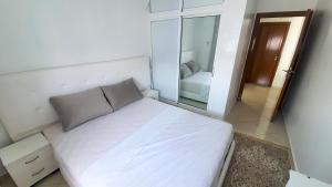 Postel nebo postele na pokoji v ubytování Appartement Martil a 5min de la corniche
