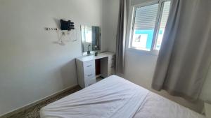 Postel nebo postele na pokoji v ubytování Appartement Martil a 5min de la corniche