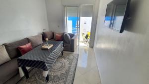 Posezení v ubytování Appartement Martil a 5min de la corniche