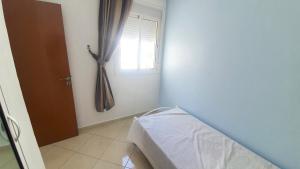 Postel nebo postele na pokoji v ubytování Appartement Martil a 5min de la corniche