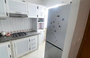 Kuchyň nebo kuchyňský kout v ubytování Appartement Martil a 5min de la corniche