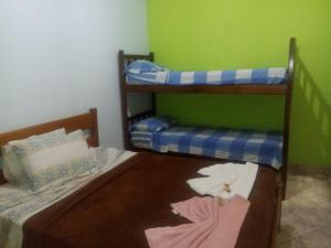 Postel nebo postele na pokoji v ubytování Pousada e Hostel Chapada Suites