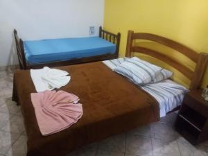 Postel nebo postele na pokoji v ubytování Pousada e Hostel Chapada Suites