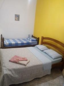 Postel nebo postele na pokoji v ubytování Pousada e Hostel Chapada Suites