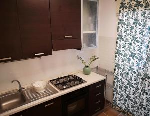 A kitchen or kitchenette at Villa Vittorio - Splendid panoramic sea view terrace