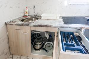Kuchyňa alebo kuchynka v ubytovaní Apartments & Rooms Strčić Petra